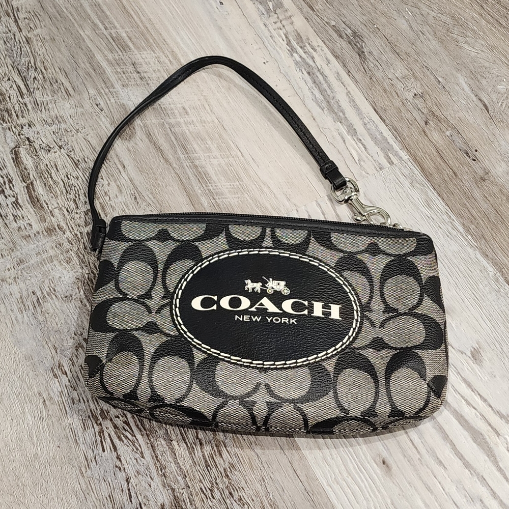Coach Signature Horse & Carriage Wristlet